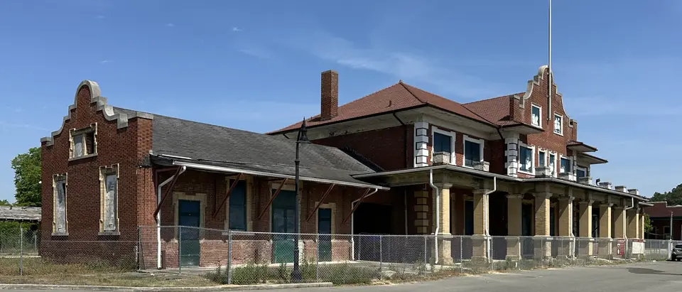The historic red-brick Union Station under a blue sky in downtown Goldsboro, NC