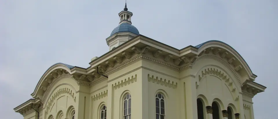 The ornate yellow Caswell County Courthouse with its domed cupola in Yanceyville, NC